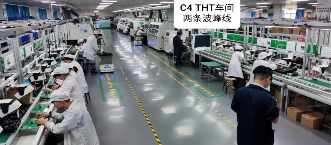 PCBA manufacturing workshop with SMT line equipment at Benchuang