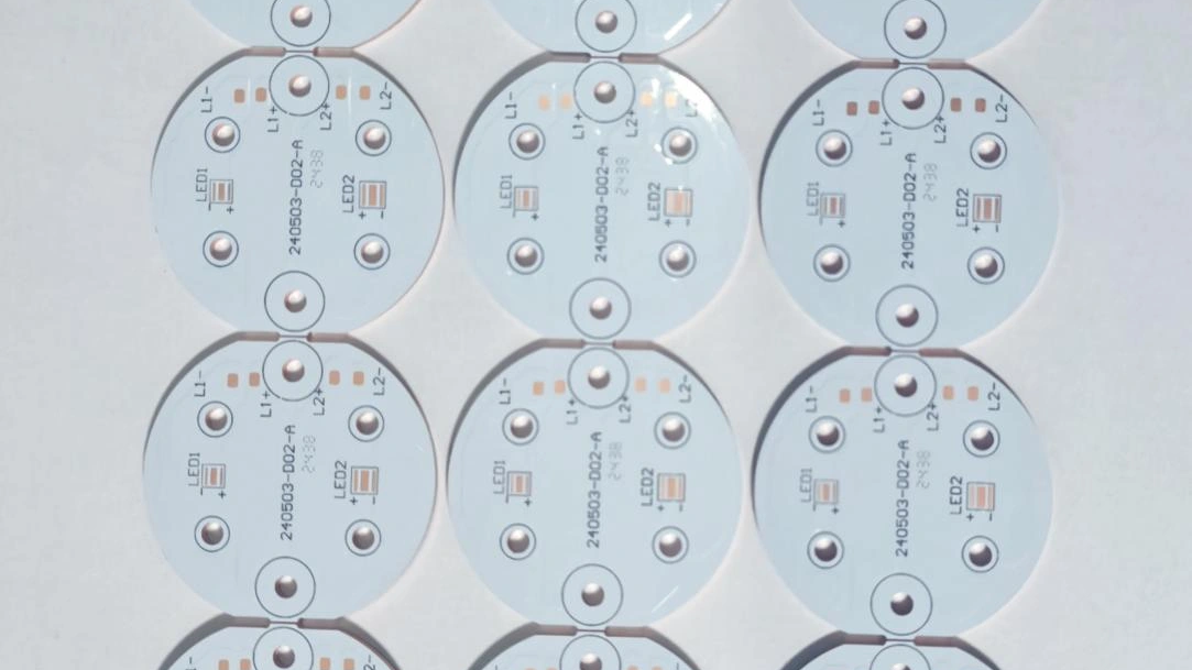 Panelized array of round white aluminum LED PCBs